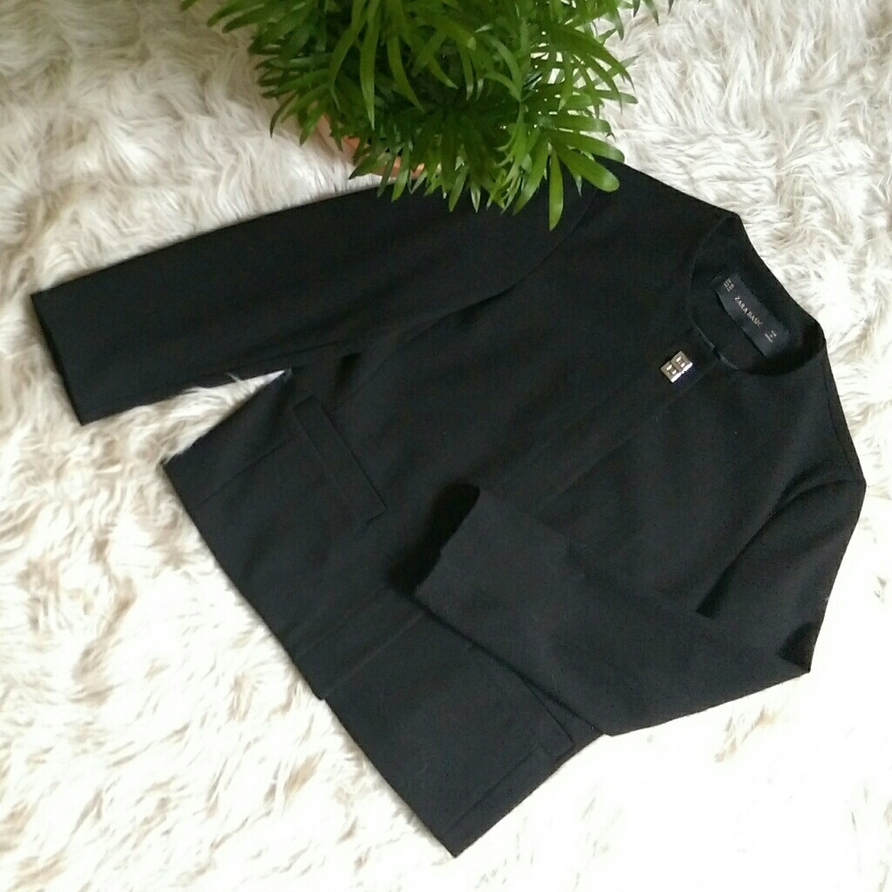 Like new, worn twice, rounded neck jacket